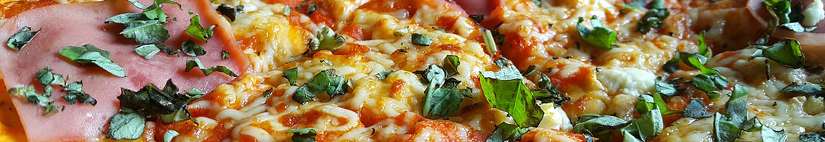 Eating Italian Pizza at Mangia Ristorante & Pizzeria restaurant in Alpharetta, GA.